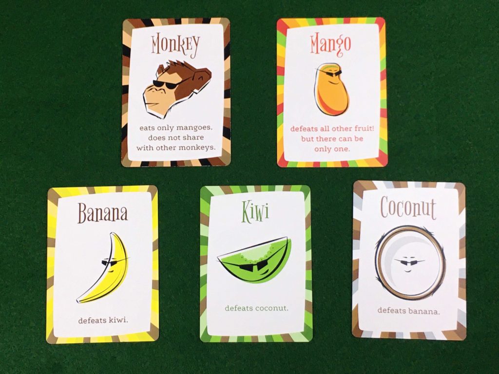 fruit for all monkey mango kiwi banana coconut hand cards: monkey eats only mangos and does not share with other monkeys, mango defeats all other fruit, but there can only be one, banana defeats kiwi, kiwi beats coconut, coconut beats banana